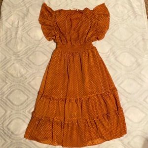 Pink shimmery dress with polka dots